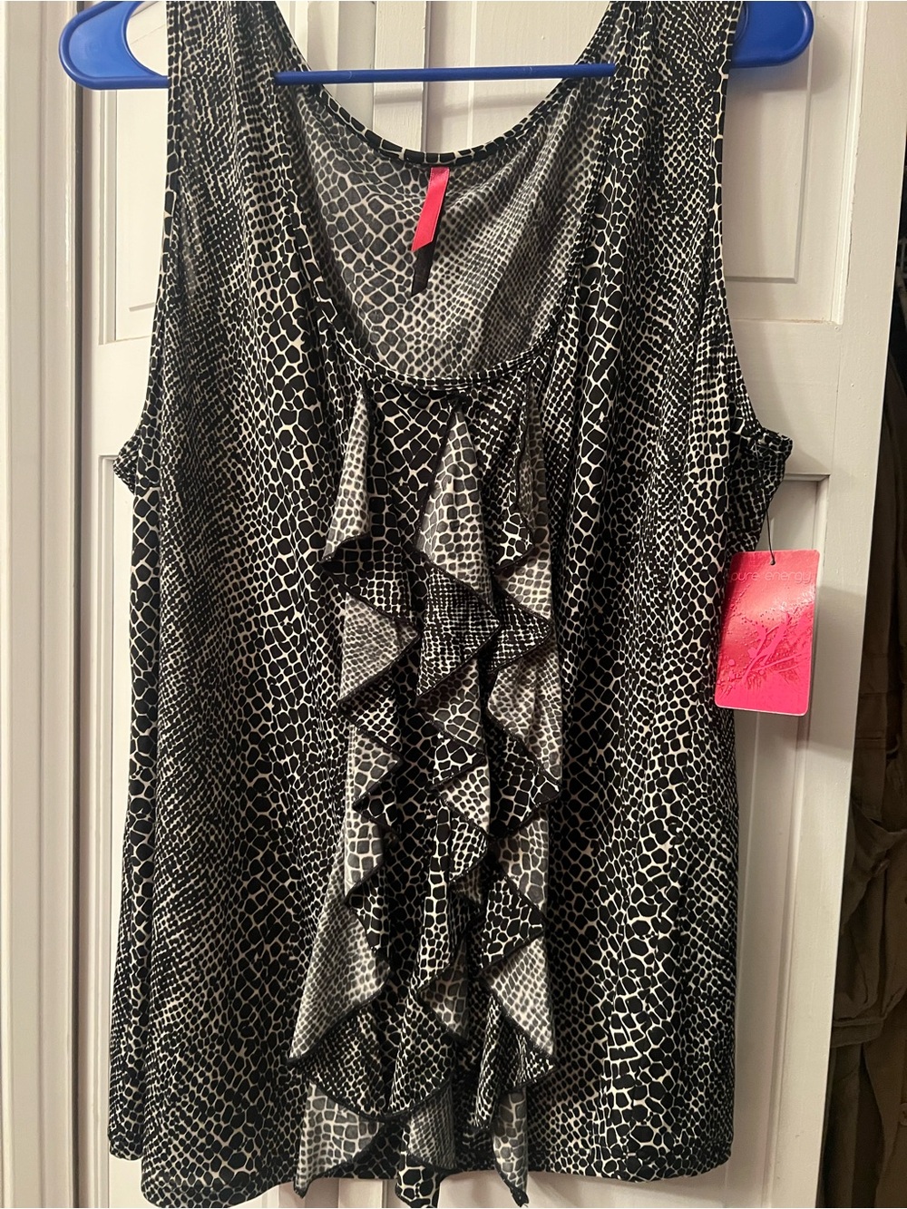 Women’s blouse tank top. Beautiful ruffle down the center